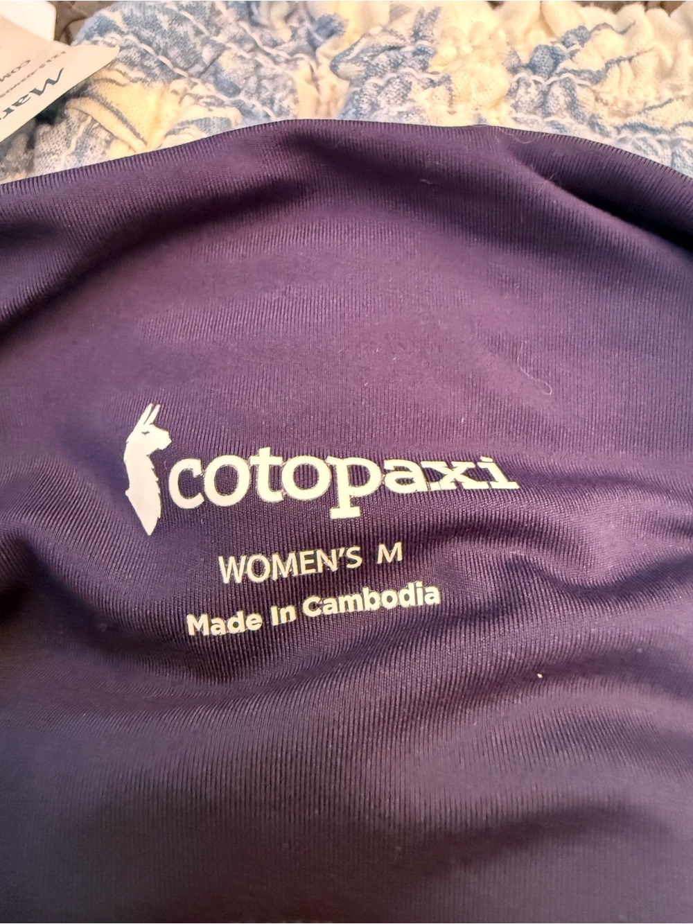 cotopaxi Women's Tee in Purple with White Logo